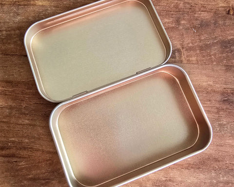 Boîte couleur or rose métallique, vide pour 16 demi-godets